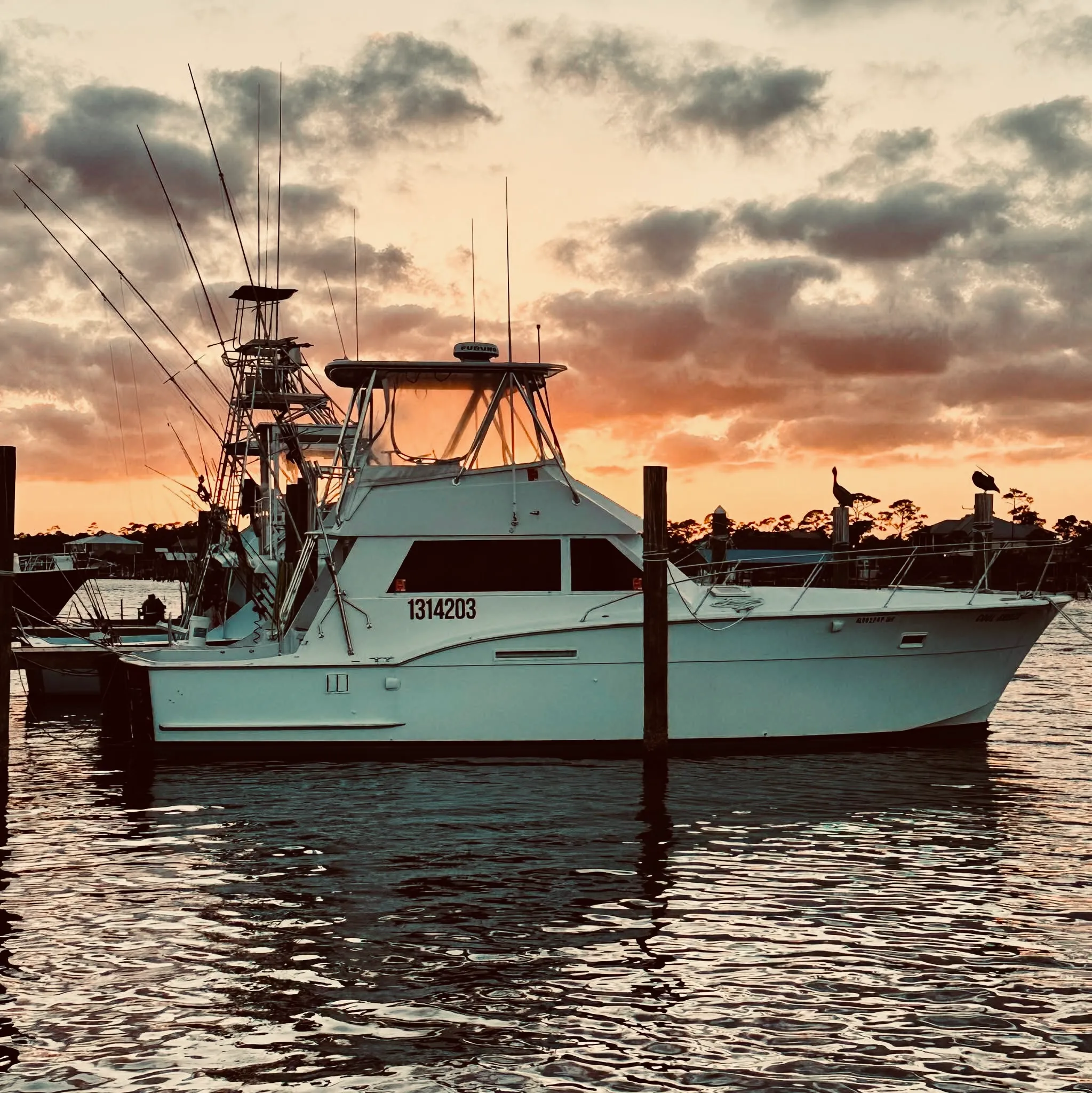 42-foot Hatteras sport fisher charter boat docked at Zeke's Marina Orange Beach Alabama